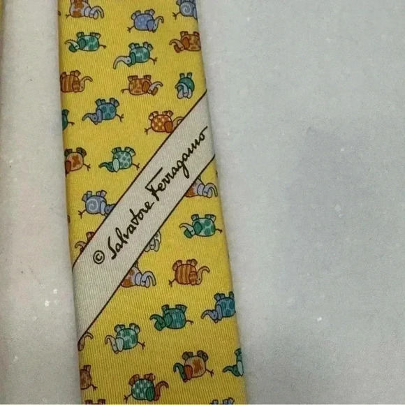 Salvatore Ferragamo luxury yellow silk tie with small whimsical elephant print. - Picture 10 of 11